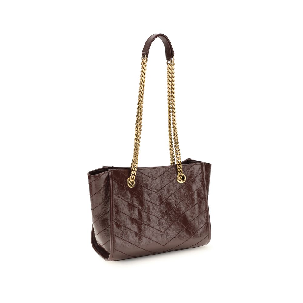 Discover the Saint Laurent Brown Calf Leather Bos Taurus Shoulder Bag, a timeless blend of luxurious craftsmanship and sophisticated design, perfect for elevating any ensemble.