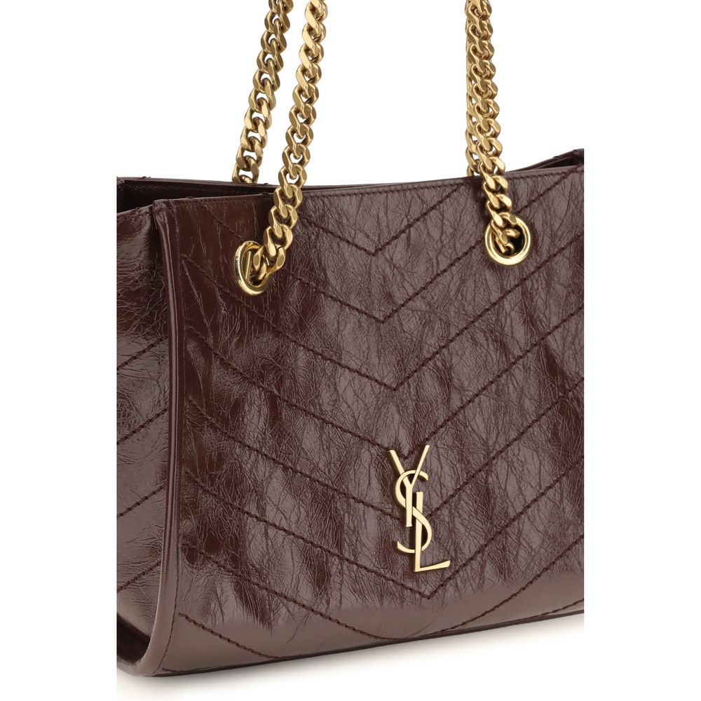 Discover the Saint Laurent Brown Calf Leather Bos Taurus Shoulder Bag, a symbol of timeless elegance and exquisite craftsmanship, perfect for elevating any ensemble.