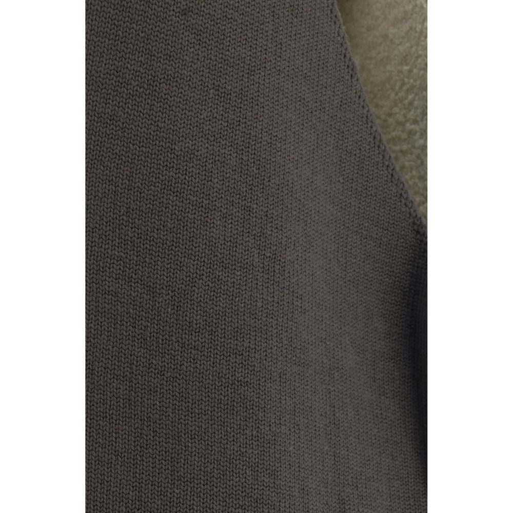 Discover the Rick Owens Gray Wool Oves Aries Sleeveless Jacket, a masterpiece of fleece wool and shearling, embodying luxury and sophistication for the discerning individual.