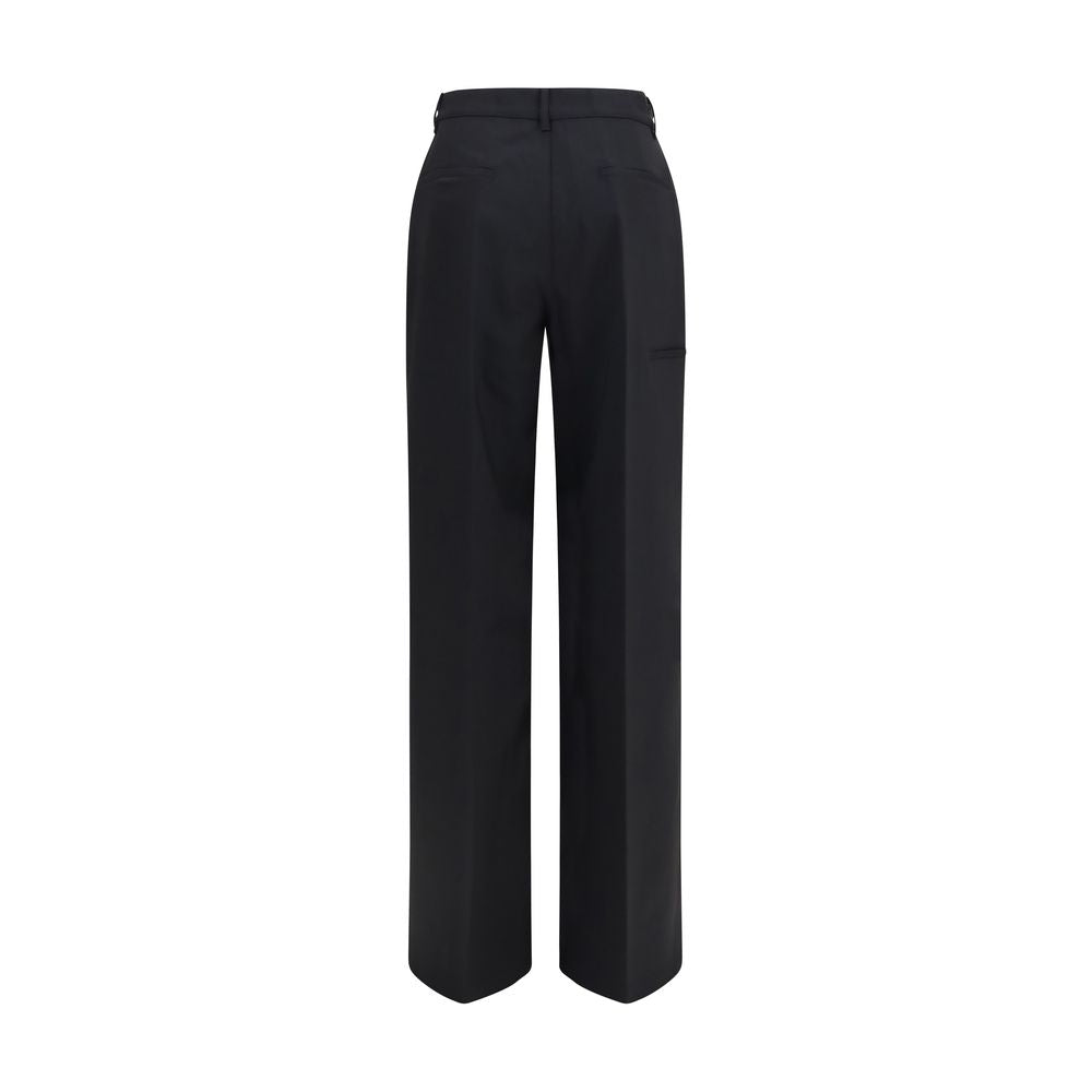 Elevate your wardrobe with Rick Owens Black Wool Oves Aries Dress Pants, where luxurious fleece wool meets sophisticated design for timeless elegance and effortless allure.