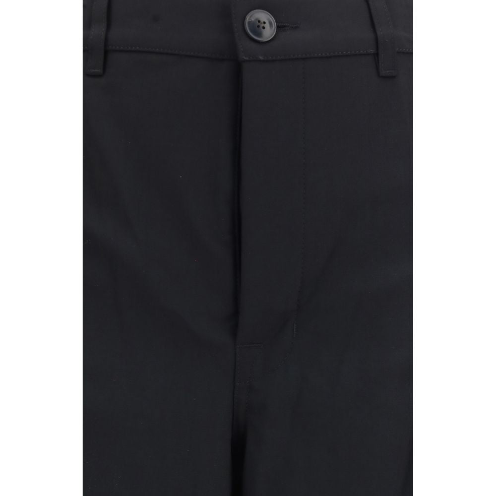 Elevate your wardrobe with Rick Owens Black Wool Oves Aries Dress Pants, crafted from luxurious fleece wool for a sophisticated, wide-leg silhouette that embodies modern elegance.
