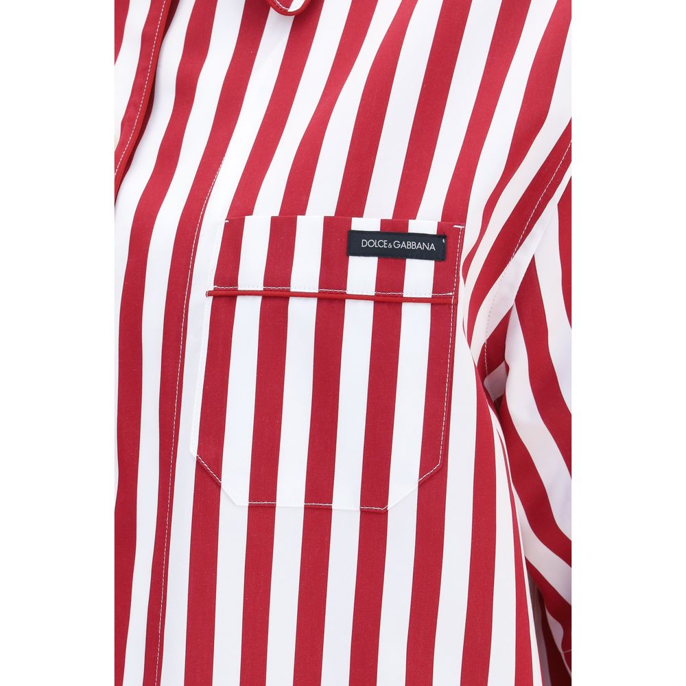 Experience the allure of the Dolce & Gabbana Multicolor Cotton Pattern Shirt, a masterful blend of striped cotton and silk, epitomizing effortless elegance and sophisticated style.