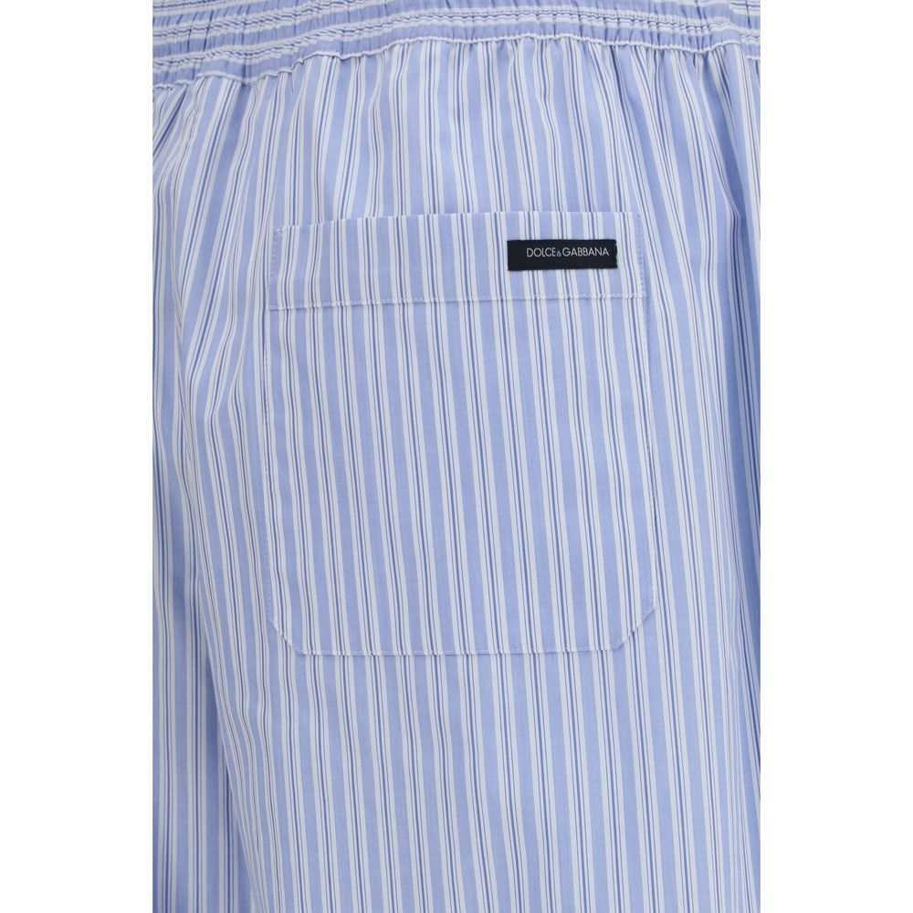 Elevate your wardrobe with Dolce & Gabbana Blue Cotton Casual Pants, crafted from luxurious multicolour striped poplin, embodying effortless elegance and refined sophistication.