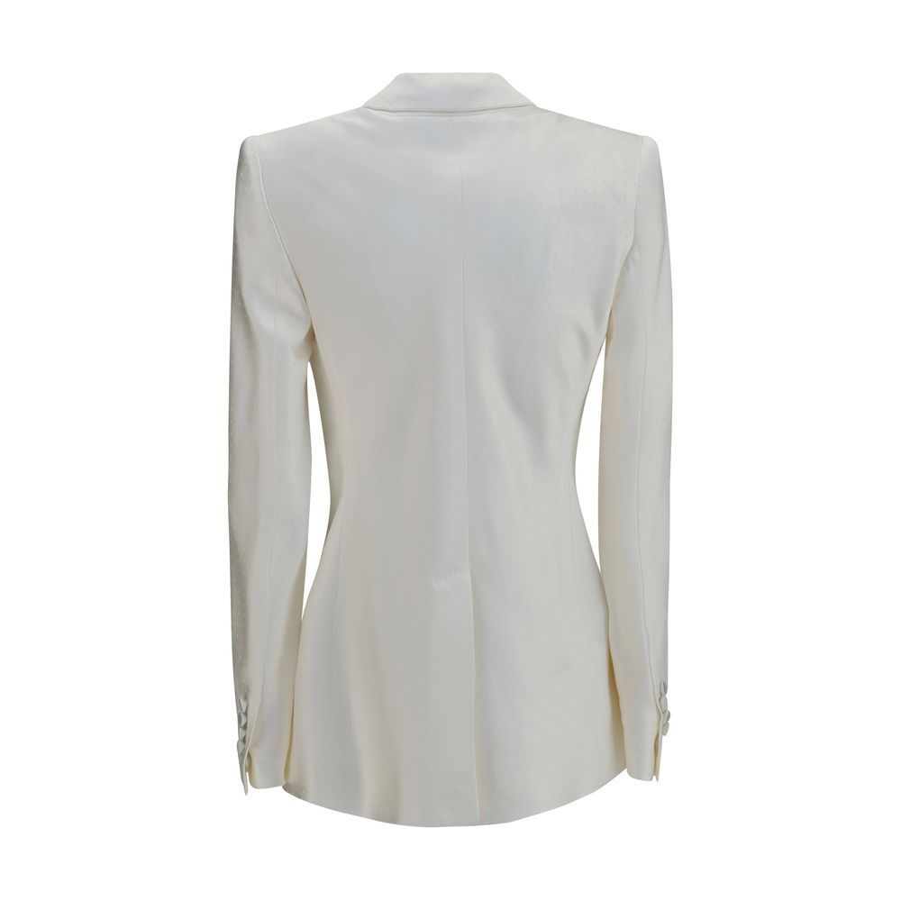 Experience the allure of the Tom Ford Beige Viscose Blazer, a masterpiece of silk and viscose, epitomizing refined elegance and sophisticated craftsmanship for the modern connoisseur.