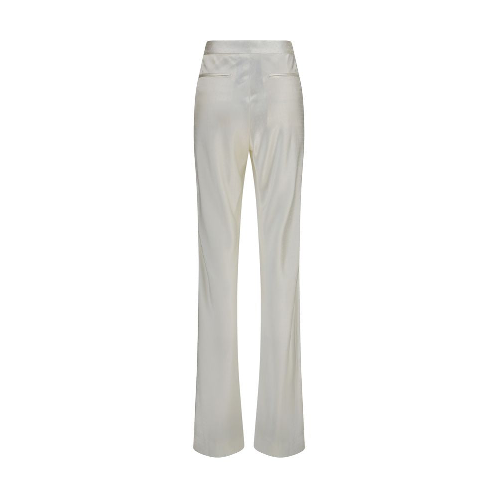 Elevate your wardrobe with Tom Ford Beige Viscose Dress Pants, a luxurious silk-viscose blend that embodies timeless elegance and refined sophistication for every occasion.