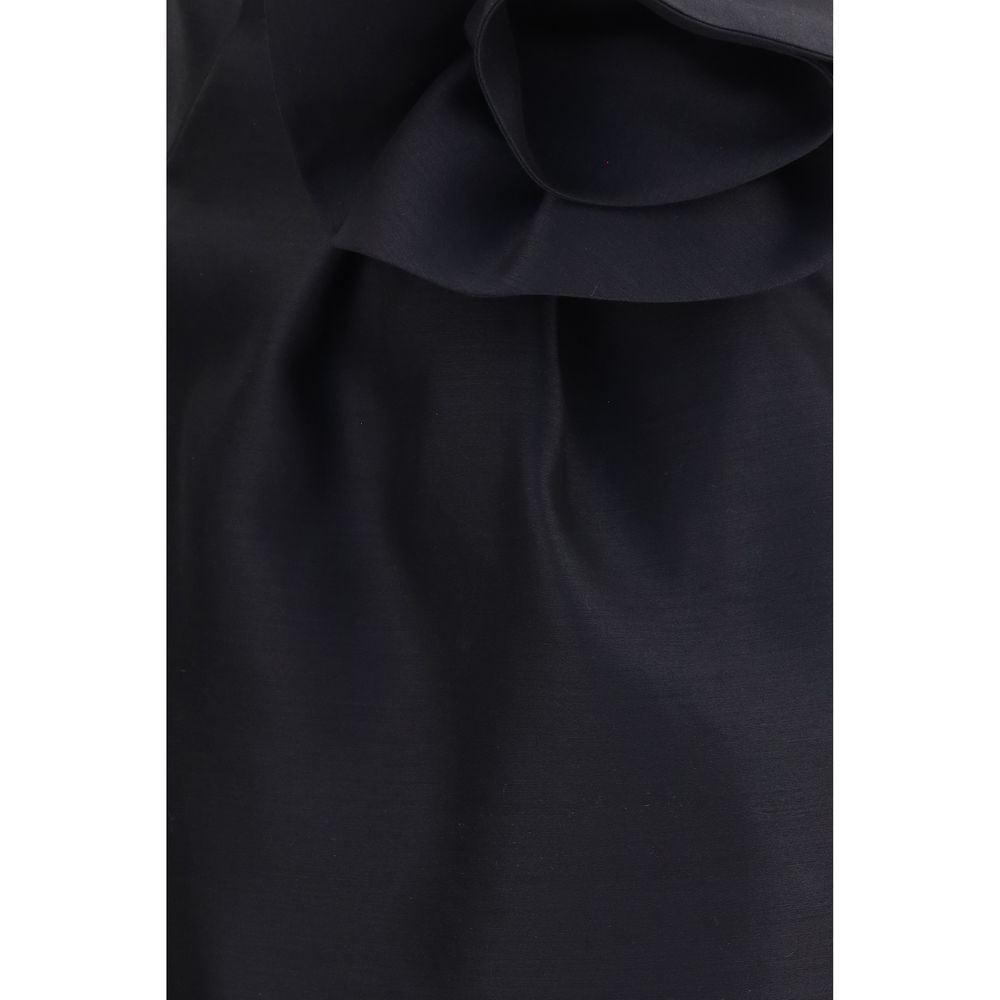 Discover the Magda Butrym Black Wool Oves Aries Mini Skirt, a luxurious blend of Merino wool and silk, embodying refined femininity and timeless elegance for the discerning individual.