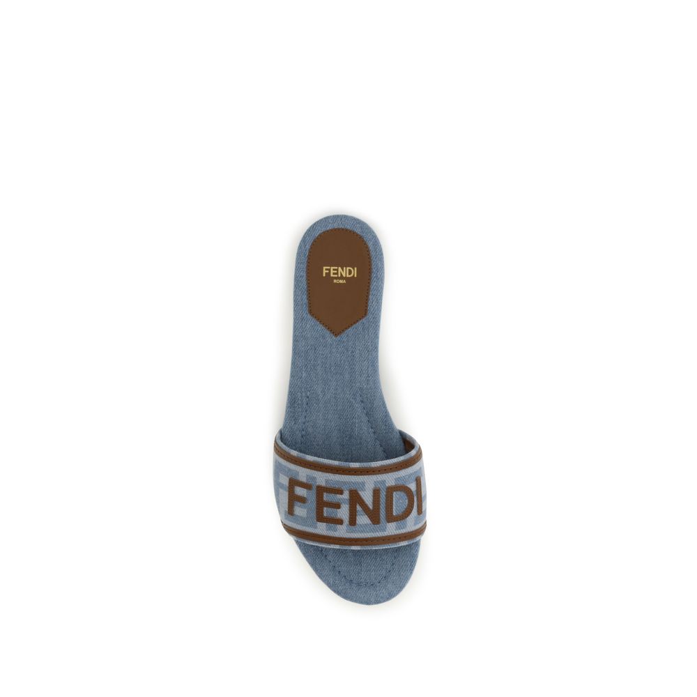 Step into refined luxury with Fendi Blue Cotton Flat Sandals, featuring exquisite jacquard craftsmanship and a versatile design that elevates any ensemble.