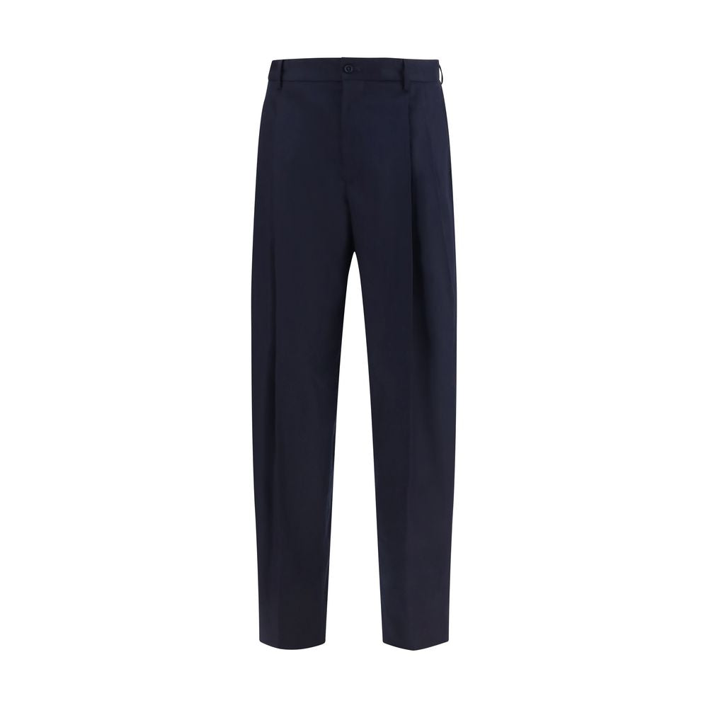 Experience the allure of Dolce & Gabbana's Blue Wool Oves Aries Dress Pants, crafted from luxurious Merino Wool for timeless elegance and sophisticated charm.