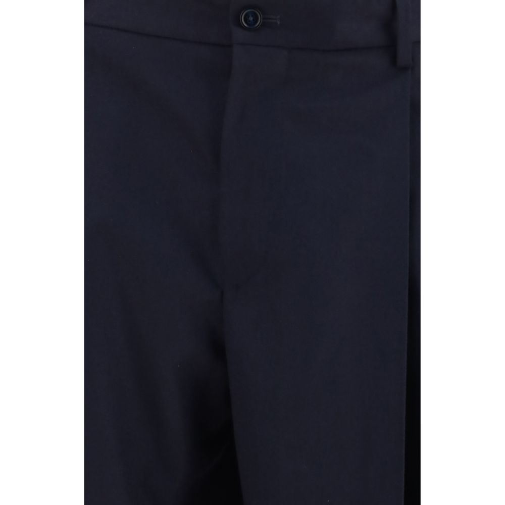 Elevate your wardrobe with Dolce & Gabbana's Blue Wool Oves Aries Dress Pants, crafted from luxurious Merino Wool for timeless sophistication and unparalleled elegance.