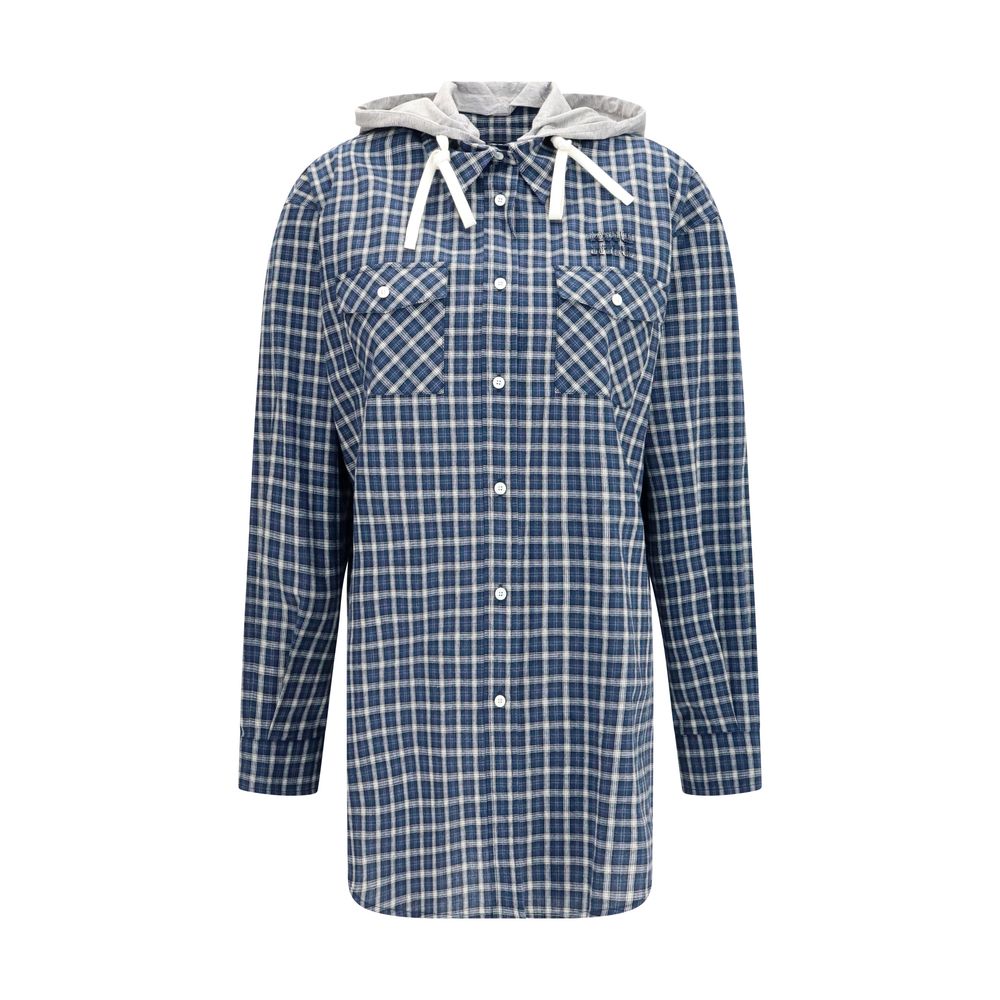 Discover the Miu Miu Blue Cotton Pattern Shirt, a masterpiece of contemporary elegance crafted from luxurious cotton, perfect for those who embody sophistication and style.