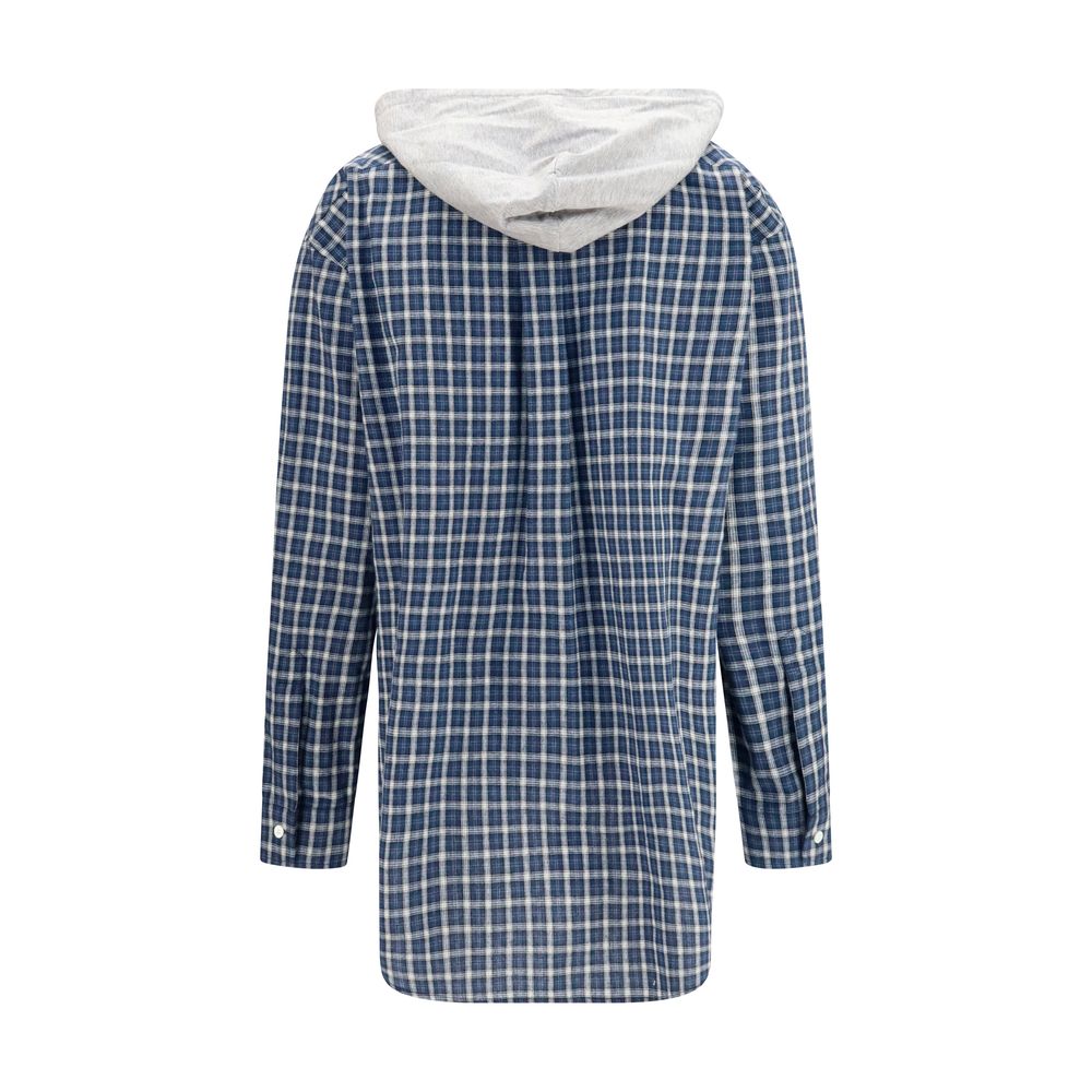Elevate your wardrobe with the Miu Miu Blue Cotton Pattern Shirt, a masterpiece of contemporary elegance crafted from luxurious cotton, perfect for effortless sophistication.
