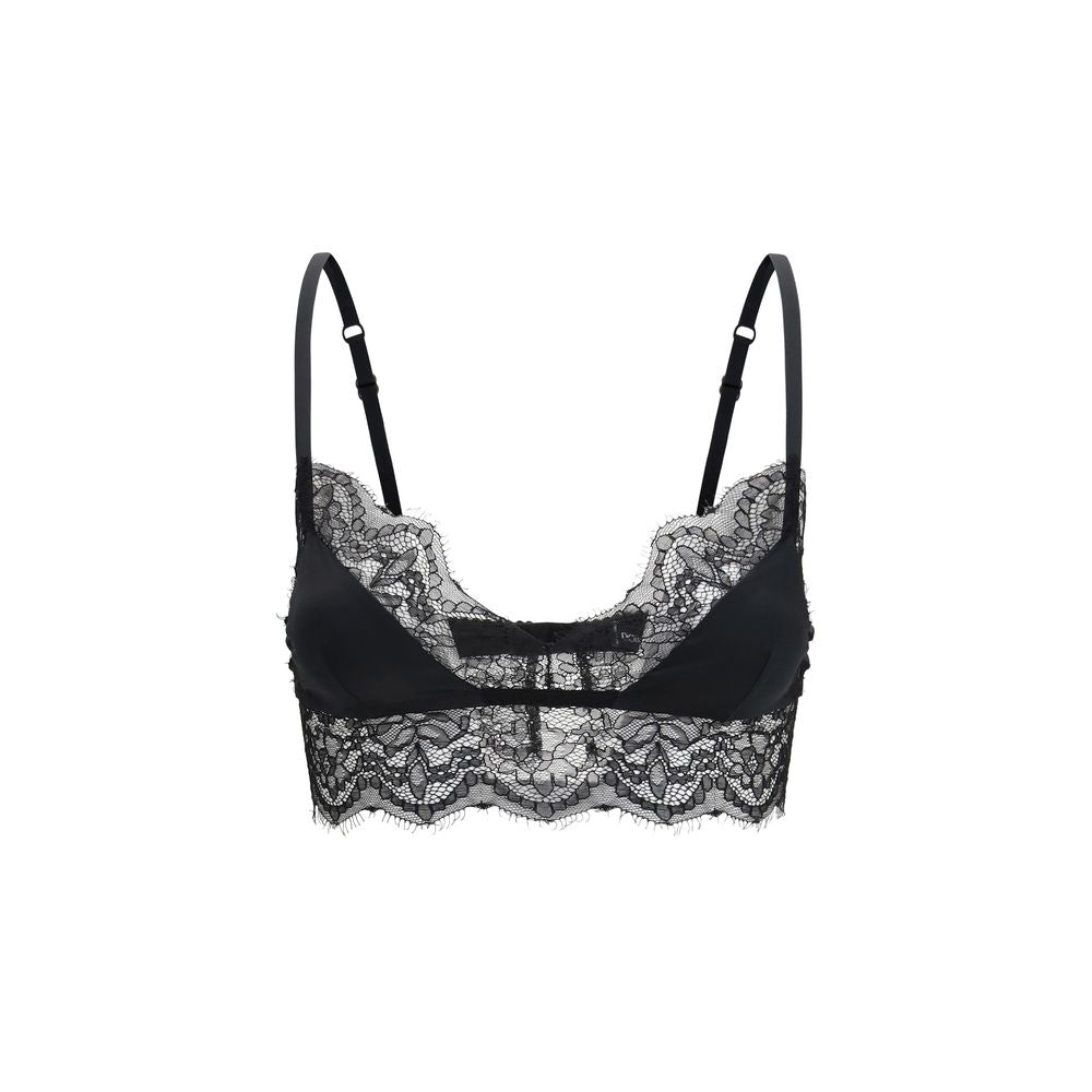 Experience the allure of the Dolce & Gabbana Black Silk Bra, a testament to Italian craftsmanship, blending luxurious silk and lace for timeless elegance.