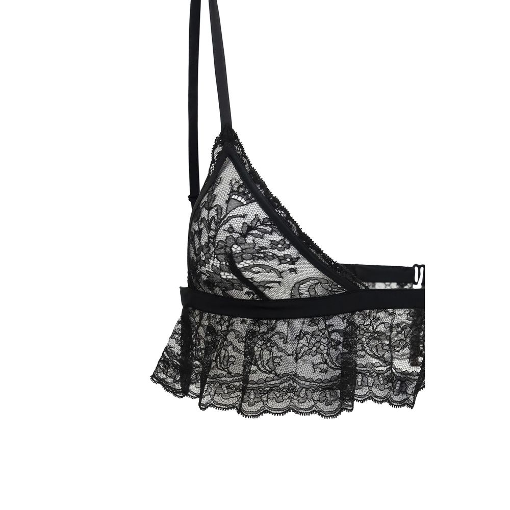 Indulge in the exquisite Dolce & Gabbana Black Cotton Bra, a luxurious blend of cotton and silk, designed for refined elegance and unparalleled comfort.