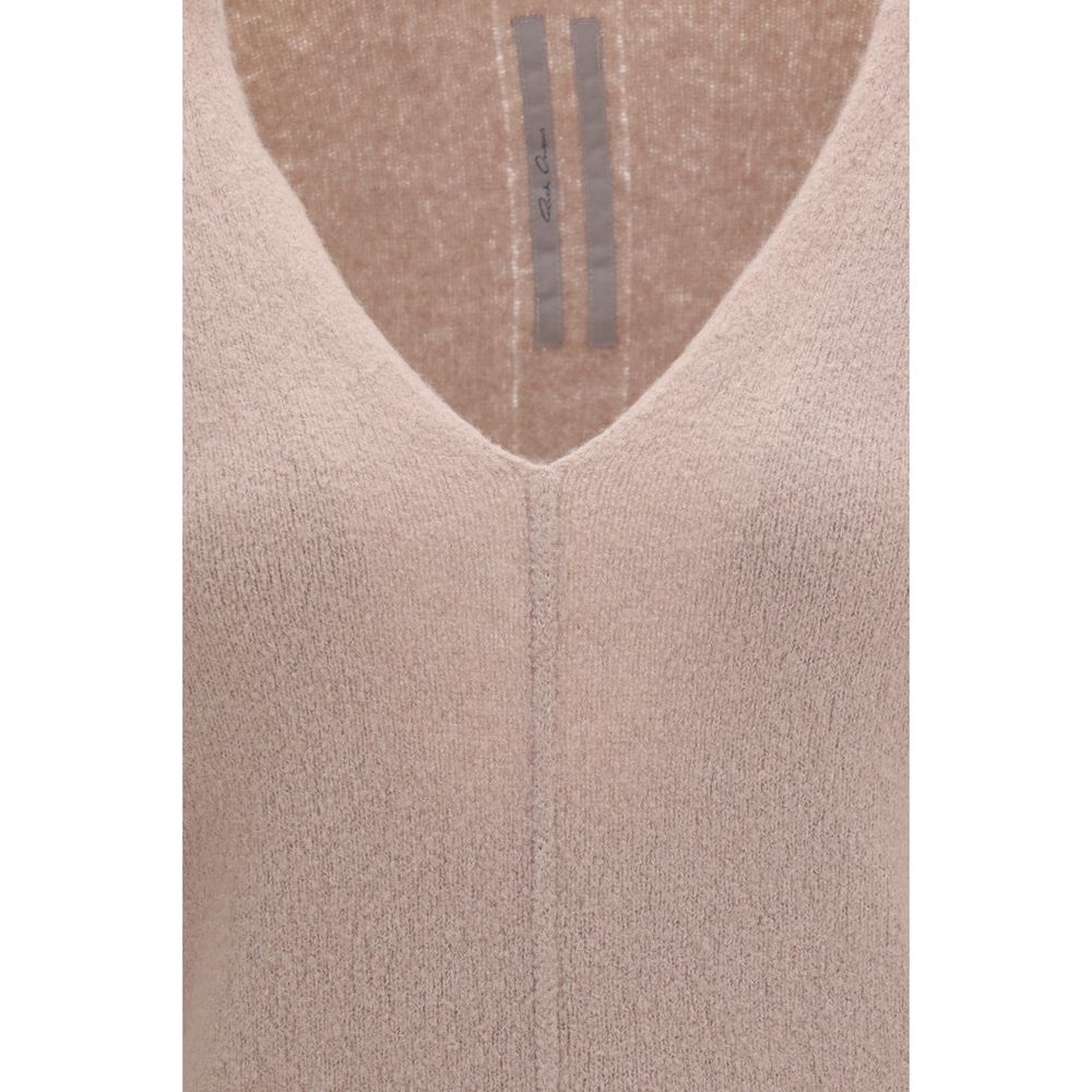 Indulge in the exquisite elegance of the Rick Owens Multicolor Cashmere Sweater, a luxurious blend of artistry and comfort that redefines sophistication for every occasion.