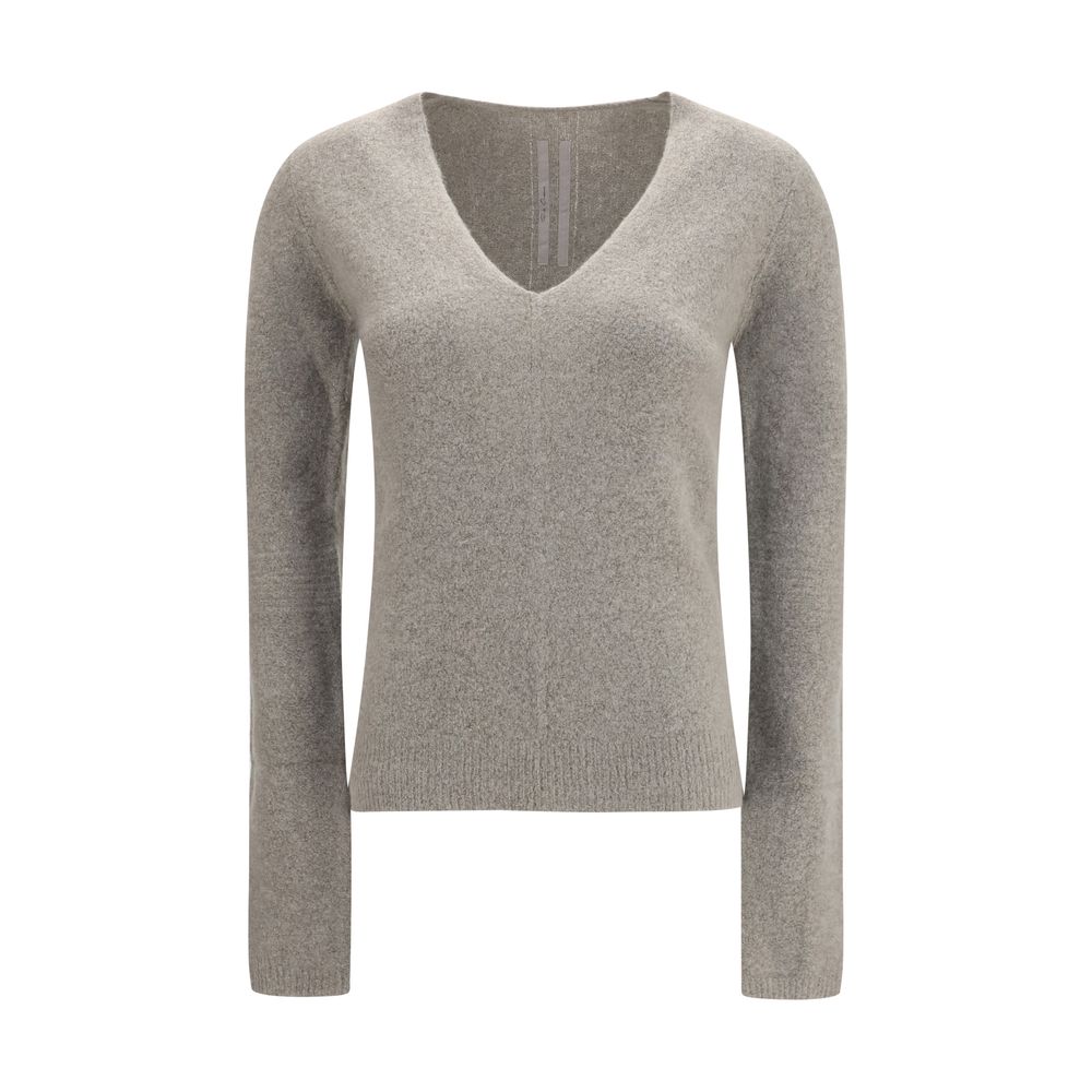 Experience the allure of the Rick Owens Gray Cashmere Sweater, a masterpiece of premium cashmere that embodies luxury and sophistication for the discerning individual.