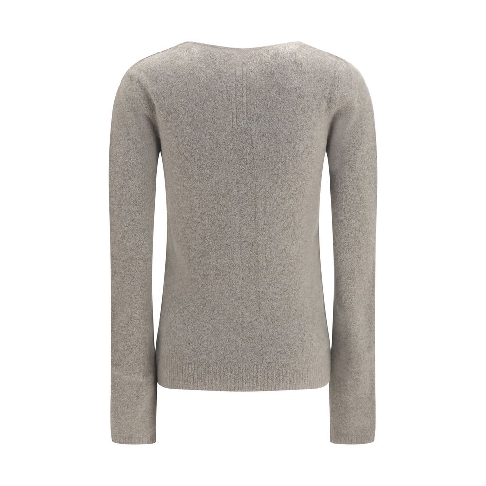 Experience the exquisite allure of the Rick Owens Gray Cashmere Sweater, a masterpiece of premium craftsmanship that embodies timeless luxury and effortless elegance.