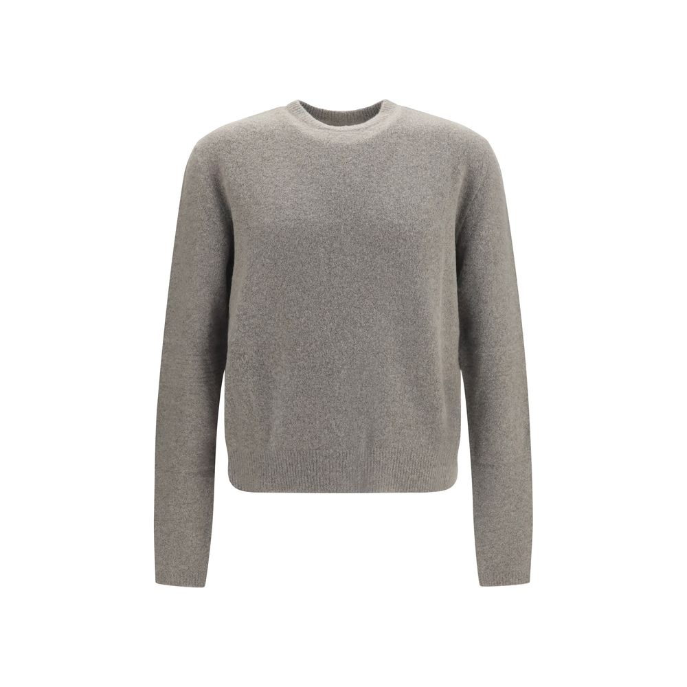 Experience the exquisite allure of the Rick Owens Gray Cashmere Sweater, a timeless blend of luxury and sophistication, crafted for those who embody elegance and confidence.