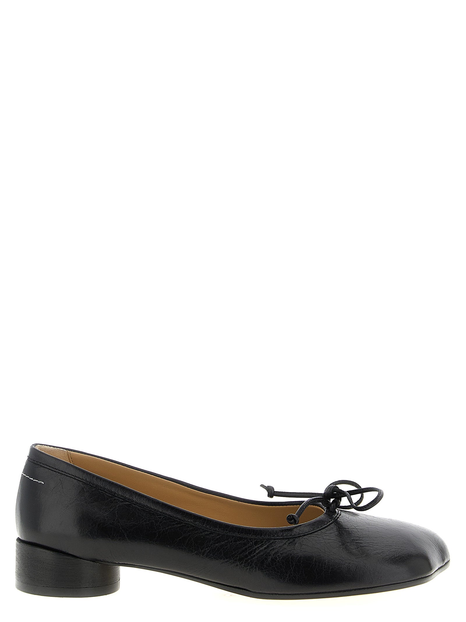 Experience the allure of MM6 Maison Margiela's Black Calfskin Mid Heel Pumps, where Italian craftsmanship meets timeless elegance, perfect for any sophisticated occasion.