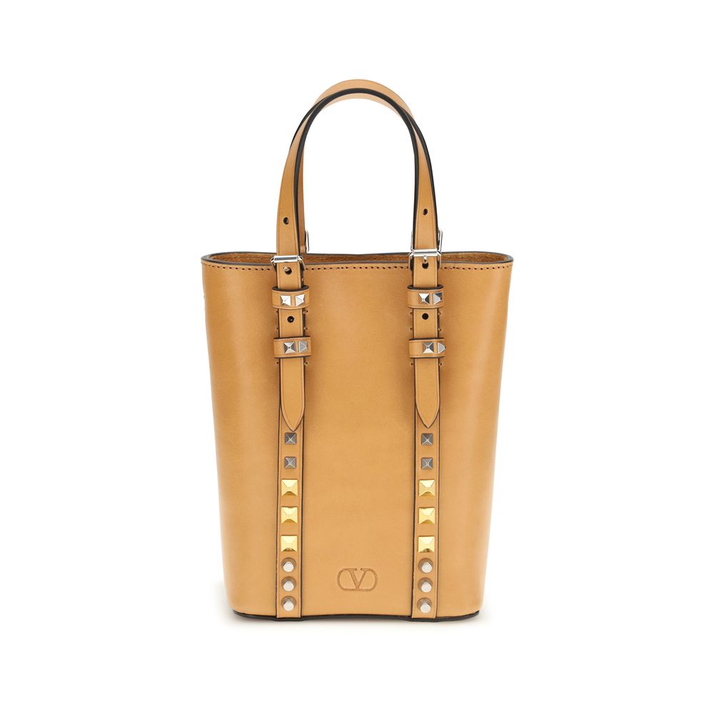 Discover the Valentino Garavani Beige Calf Leather Bos Taurus Shoulder Bag, a masterpiece of luxury and craftsmanship that elevates your style with timeless elegance.