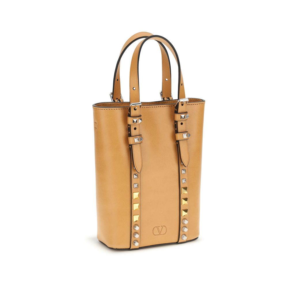 Discover the Valentino Garavani Beige Calf Leather Bos Taurus Shoulder Bag, an exquisite blend of luxury and elegance, perfect for elevating any sophisticated ensemble.