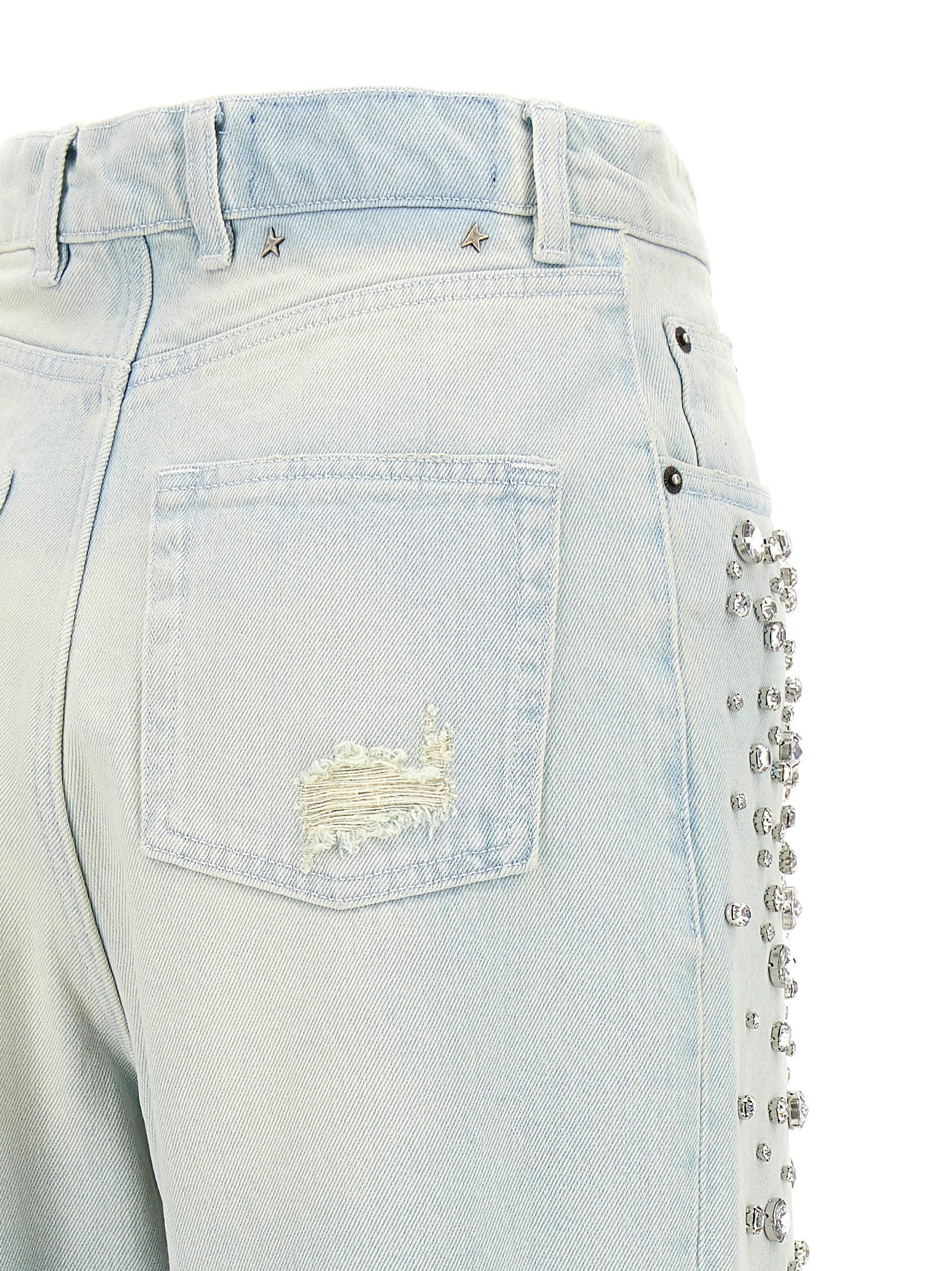 Elevate your wardrobe with Golden Goose's 'Kim' jeans, crafted in Italy from 100% cotton, featuring exquisite crystal embellishments and a chic distressed finish.