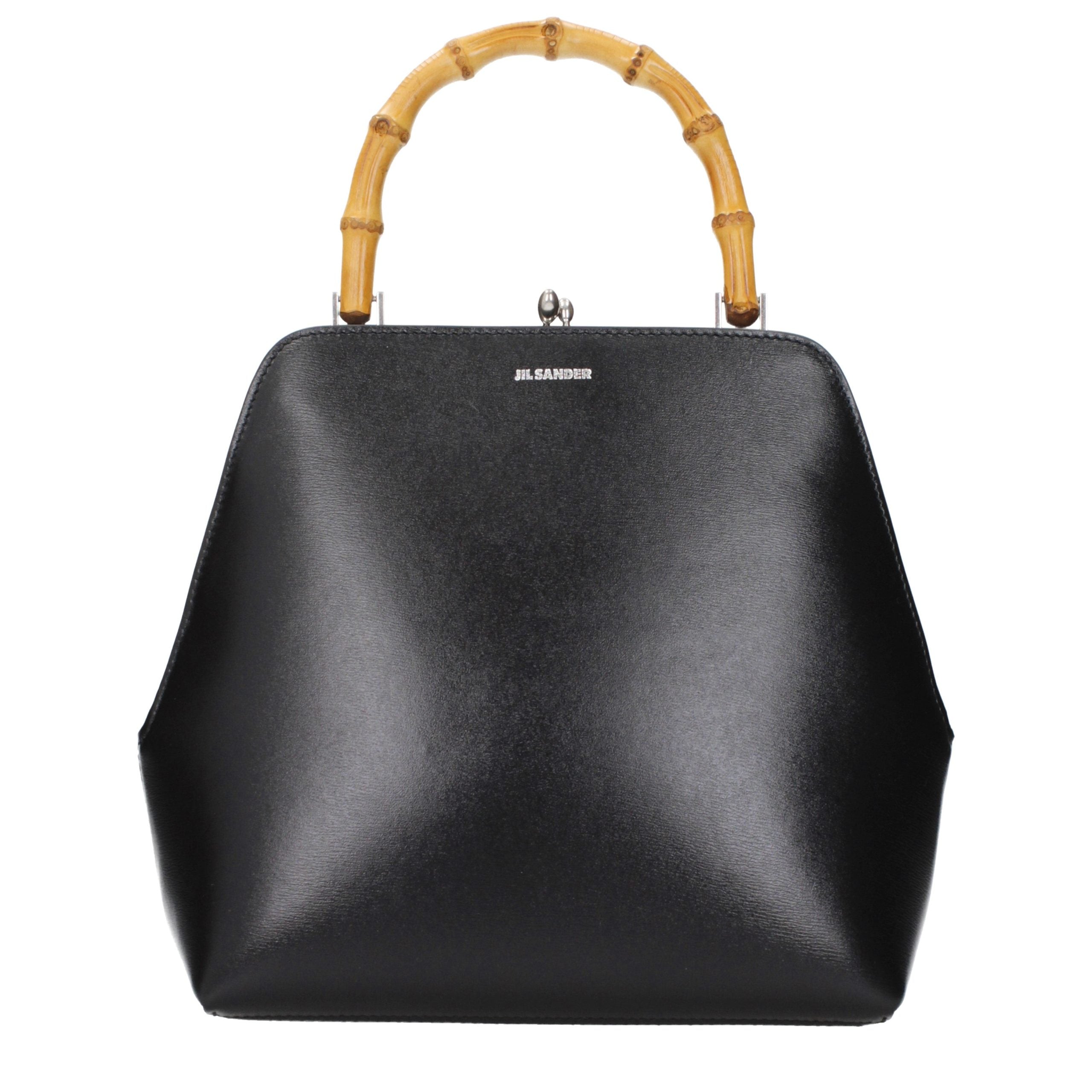 Indulge in the exquisite Jil Sander Black Leather Handbag, a timeless masterpiece of luxury craftsmanship, designed to elevate your style with unparalleled elegance.