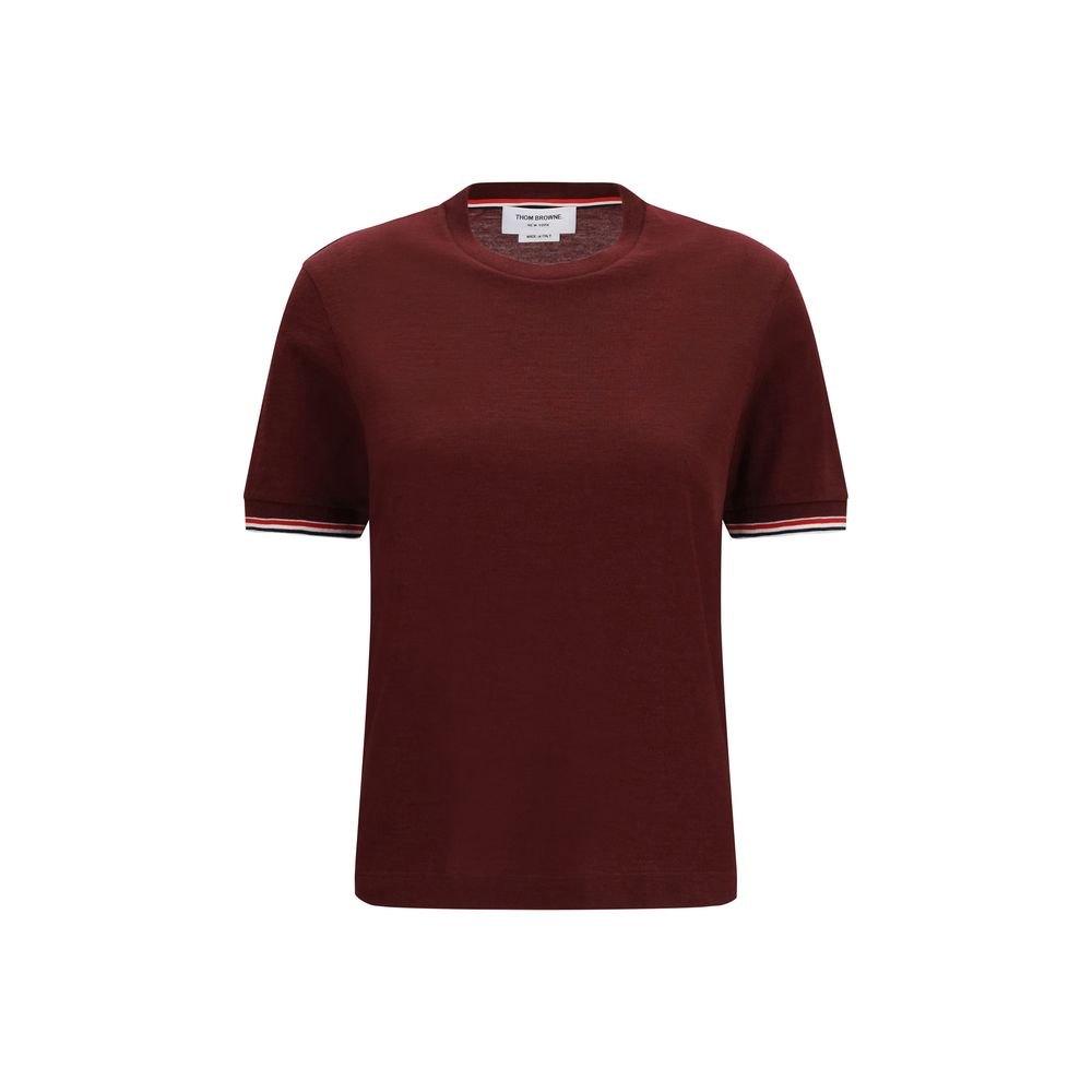 Elevate your wardrobe with the Thom Browne Bordeaux Wool Oves Aries T-Shirt, a blend of luxurious Merino wool and elastane, embodying timeless elegance and sophisticated craftsmanship.