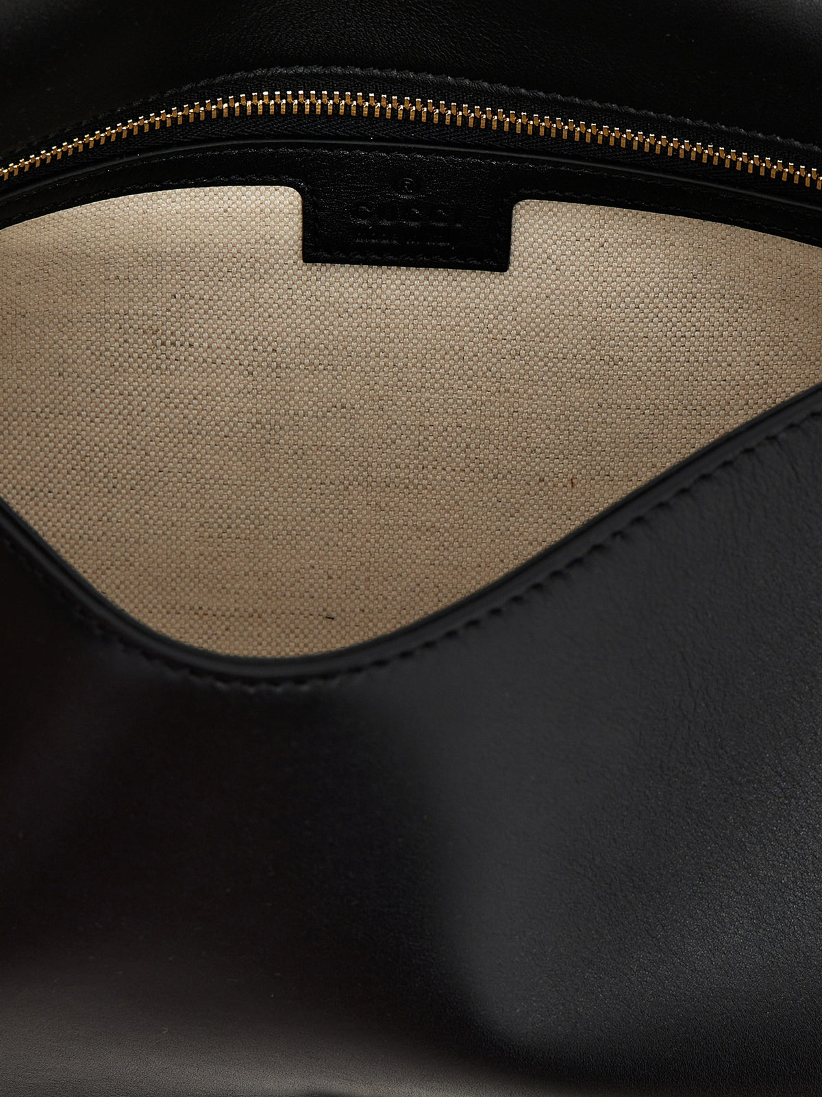 Indulge in the elegance of the Gucci Black Calfskin Handbag, a masterpiece of Italian craftsmanship, blending luxurious materials with timeless sophistication for the discerning individual.