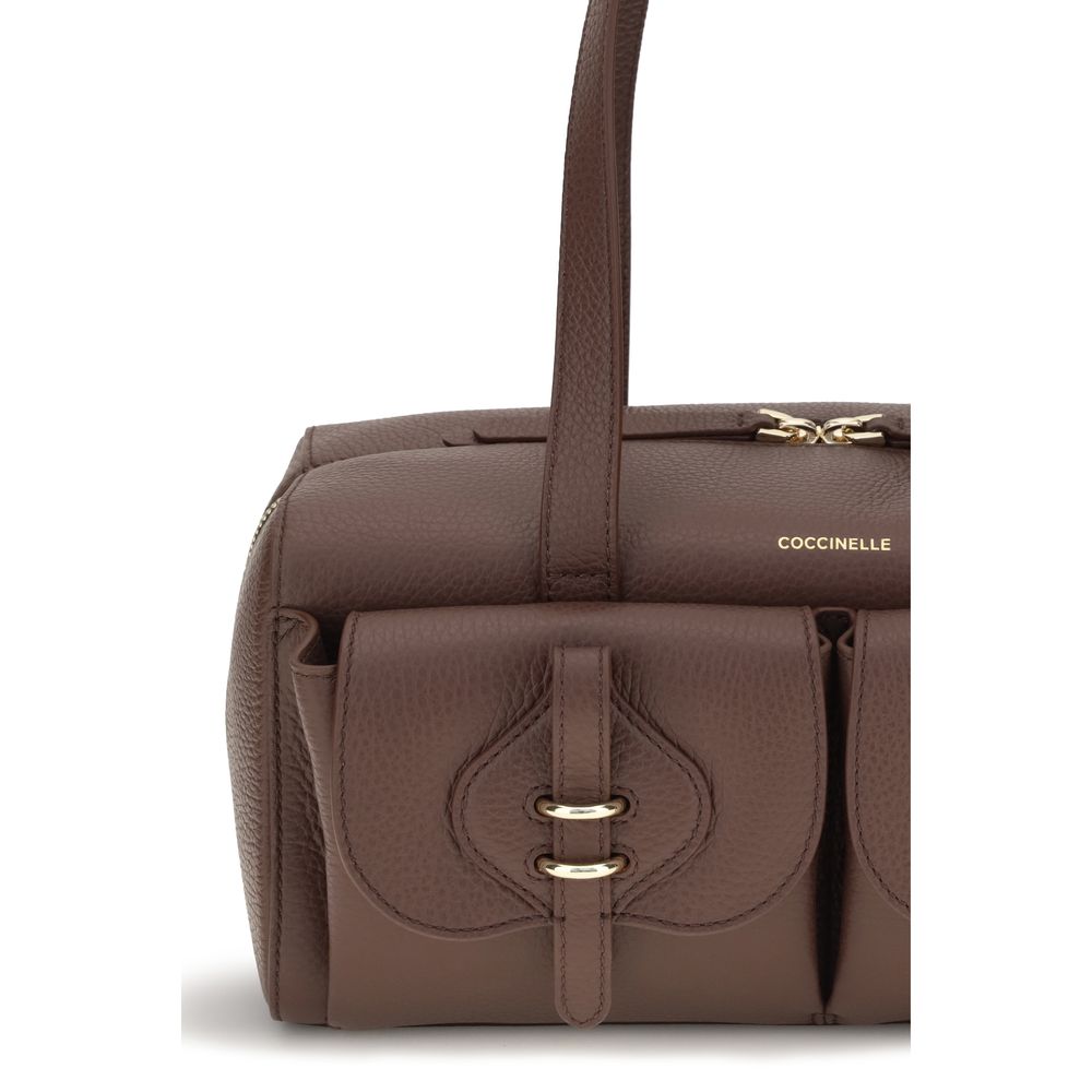 Indulge in the exquisite Coccinelle Brown Calf Leather Bos Taurus Shoulder Bag, a masterpiece of luxury and elegance, crafted for the discerning individual.