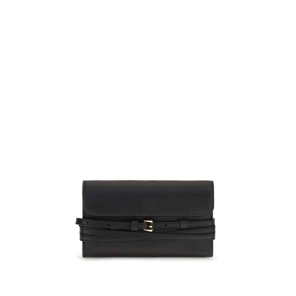 Indulge in the Moschino Black Goatskin Shoulder Bag, a timeless accessory crafted from luxurious goatskin, designed for those who embody elegance and sophistication.