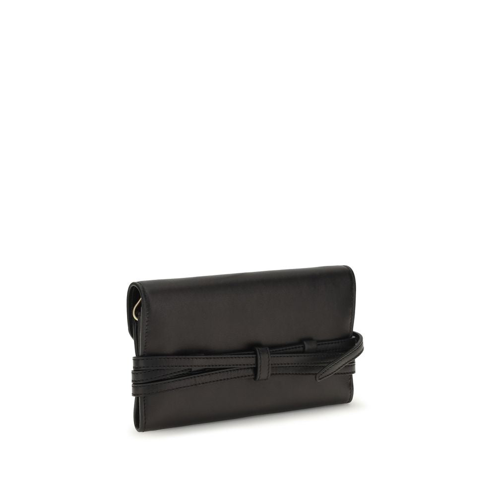Indulge in the Moschino Black Goatskin Shoulder Bag, a refined masterpiece of luxurious craftsmanship, perfect for elevating your style with timeless elegance.