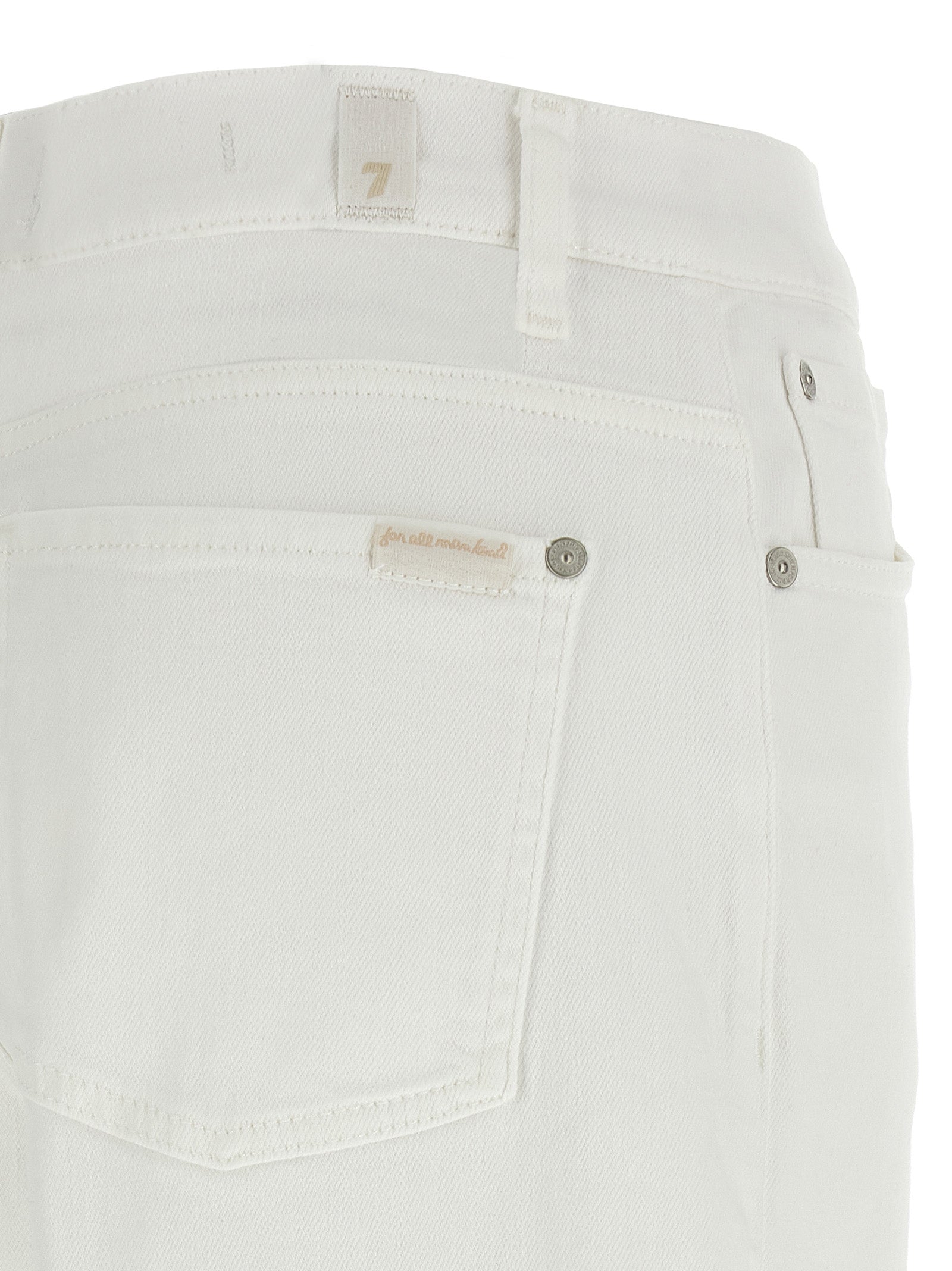 Discover the timeless elegance of 7 For All Mankind White Cotton Straight-Leg Jeans, crafted from a luxurious blend for unparalleled comfort and sophistication.