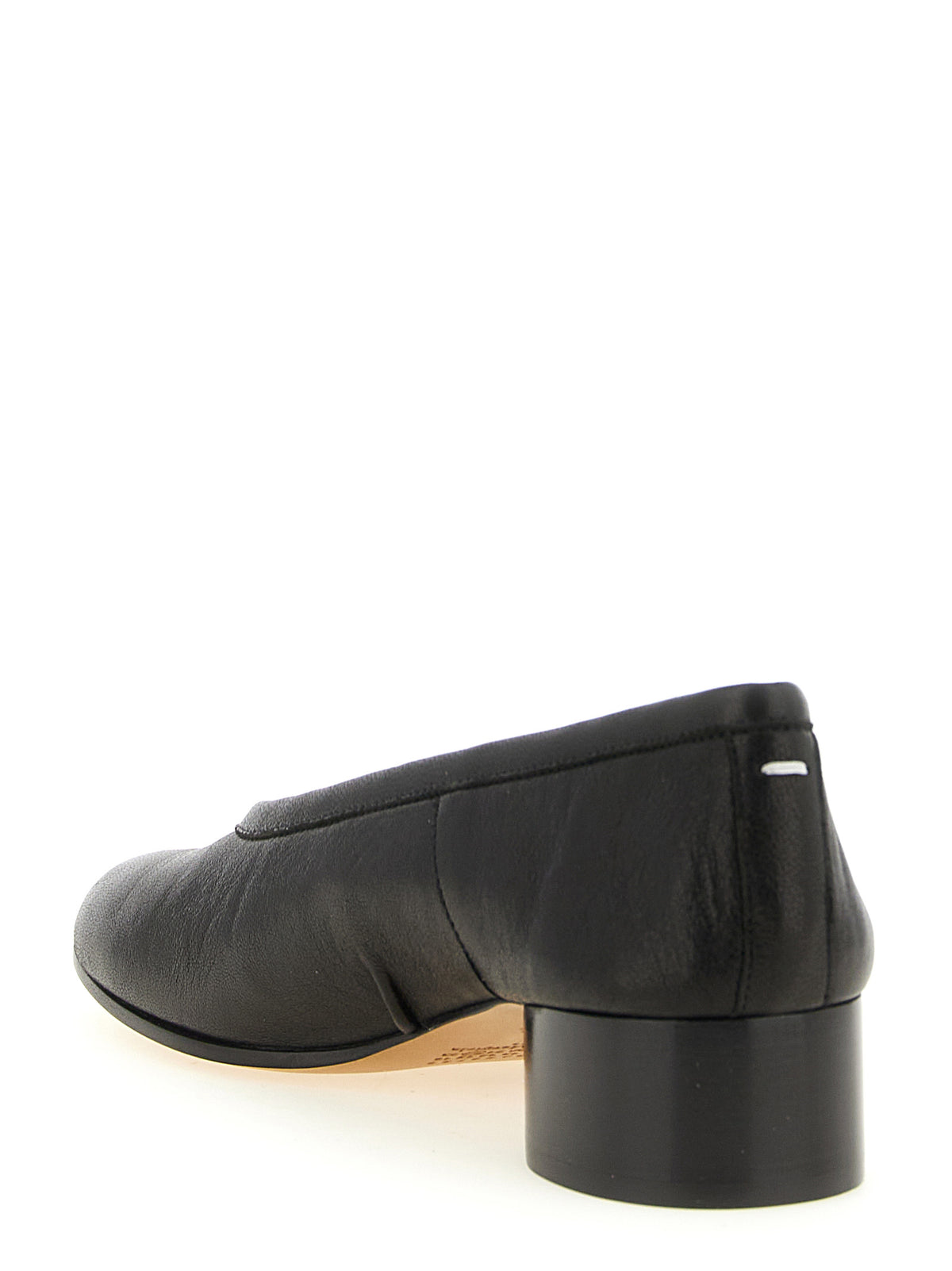 Step into a realm of elegance with Maison Margiela's Black Lamb Leather Mid Heel Pumps, where exquisite craftsmanship meets timeless luxury for the discerning individual.