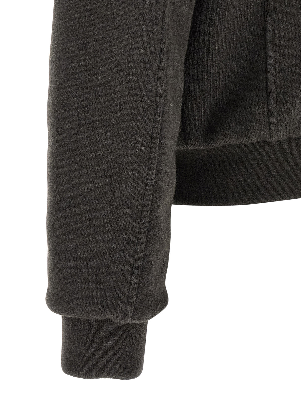 Experience the MooRER Brown Wool Bomber, a masterful blend of 90% wool and 10% cashmere, embodying Italian craftsmanship and timeless elegance for the discerning individual.