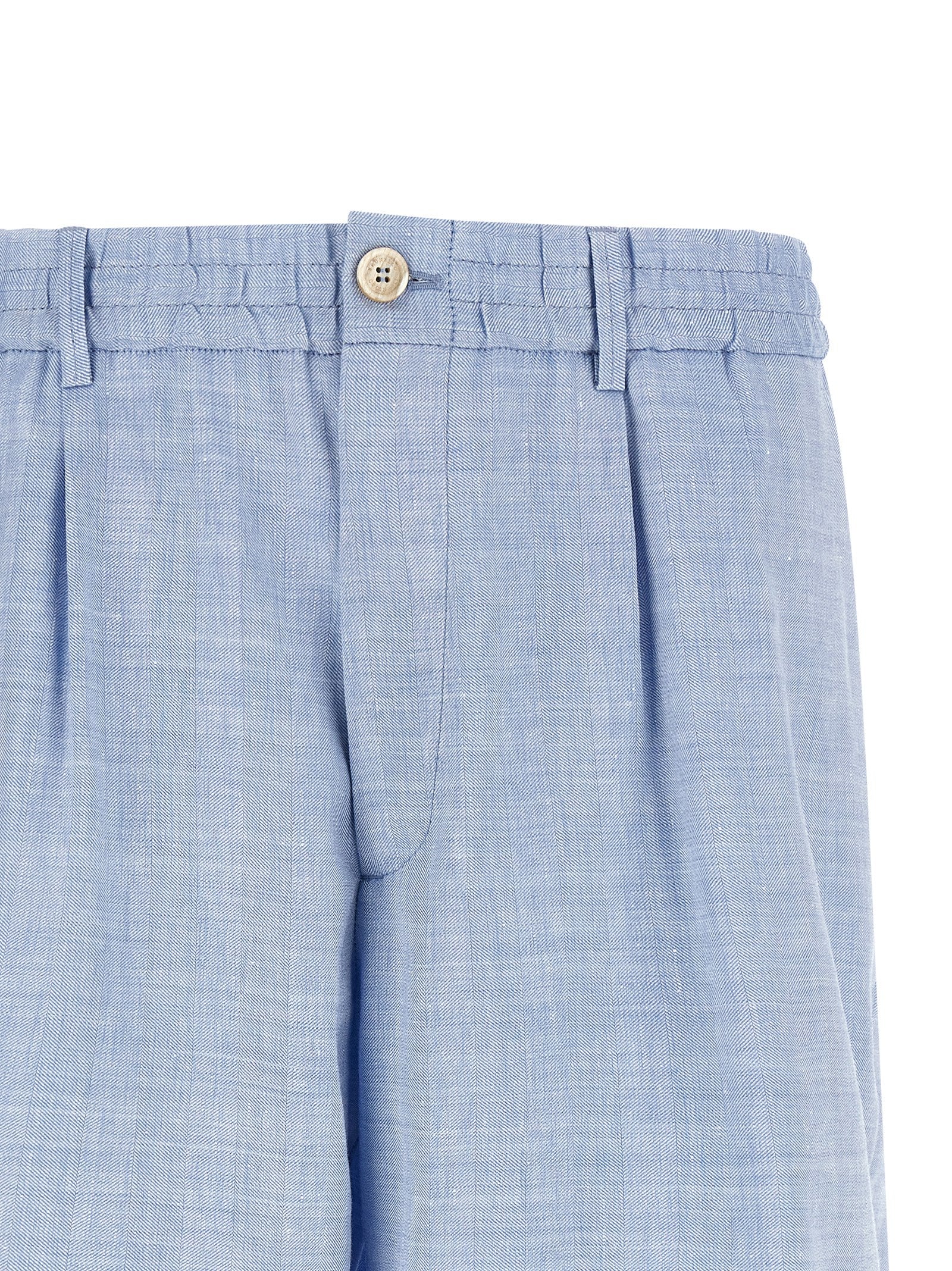 Indulge in the exquisite Brunello Cucinelli Blue Linen Bermuda Shorts, crafted from a luxurious linen-virgin wool blend, embodying effortless elegance for discerning tastes.