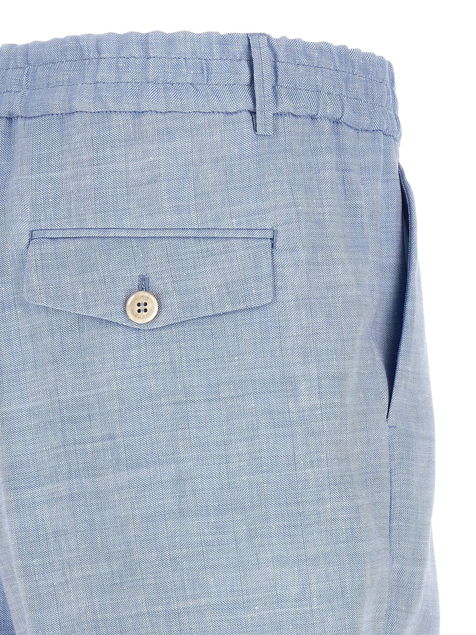 Indulge in the exquisite Brunello Cucinelli Blue Linen Bermuda Shorts, crafted from a luxurious linen-virgin wool blend, embodying effortless elegance for the discerning individual.