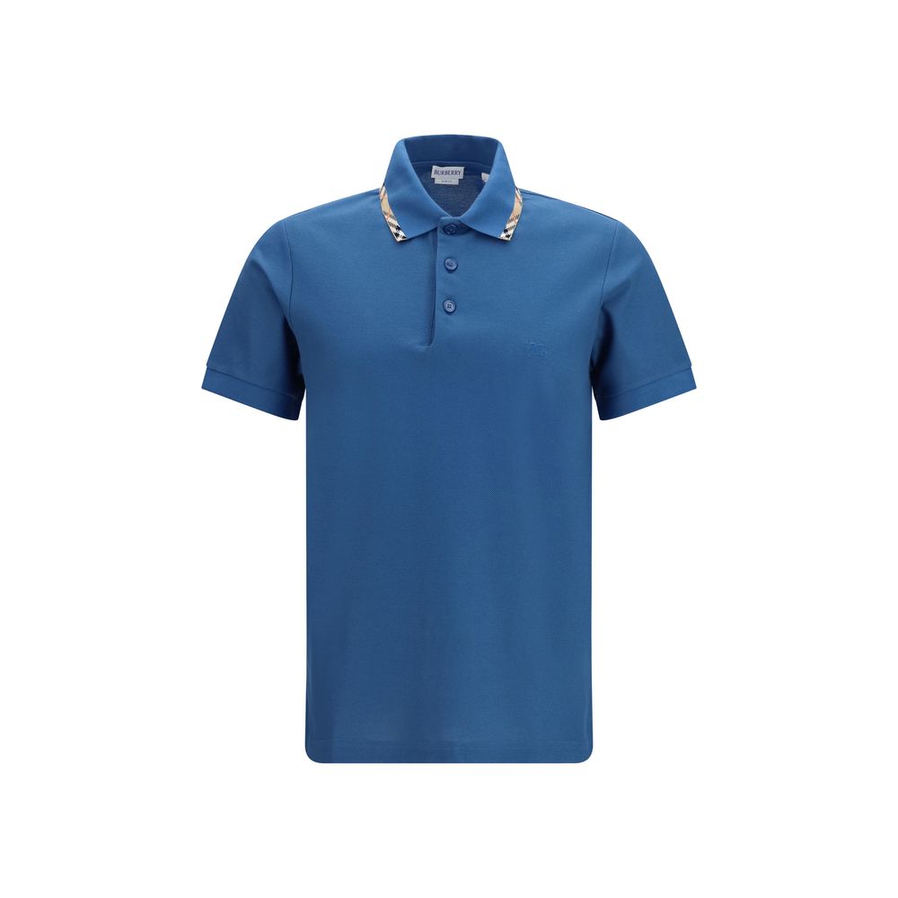 Discover the Burberry Blue Cotton Polo Shirt, a timeless blend of luxurious craftsmanship and iconic design, perfect for those who embody elegance and sophistication.