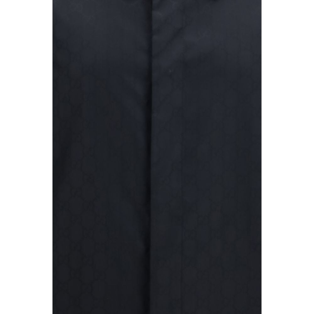 Experience the allure of the Gucci Black Polyamide Full-Length Jacket, crafted from luxurious silk faille, embodying timeless elegance and sophisticated style for discerning tastes.