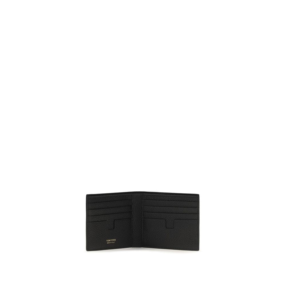 Discover the Tom Ford Black Calf Leather Bos Taurus Wallet, a masterpiece of craftsmanship in luxurious pebbled leather, perfect for the discerning individual seeking elegance and functionality.