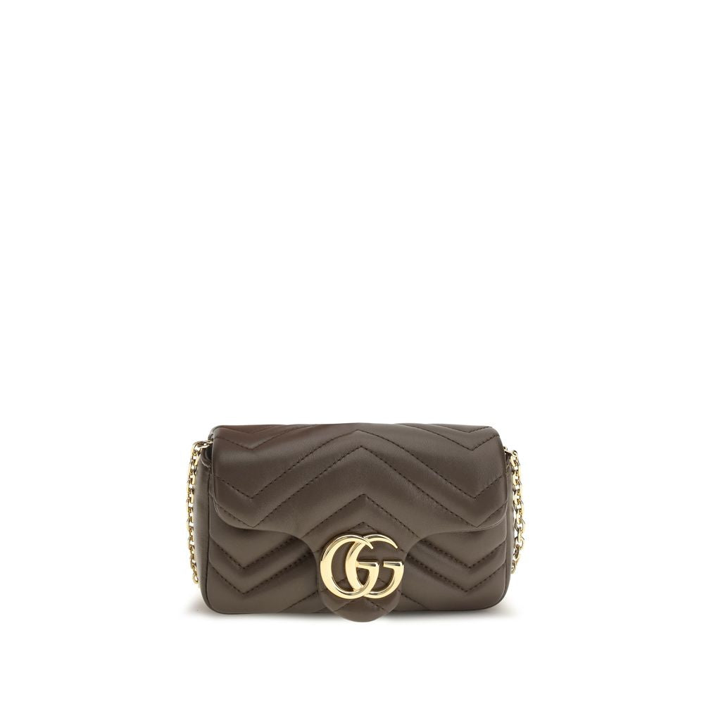 Indulge in the exquisite allure of the Gucci Brown Calf Leather Bos Taurus Handbag, a timeless masterpiece crafted from soft matelassé chevron leather, embodying luxury and sophistication.