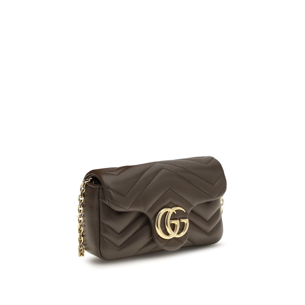 Indulge in the exquisite craftsmanship of the Gucci Brown Calf Leather Bos Taurus Handbag, a timeless symbol of luxury and elegance for the discerning individual.