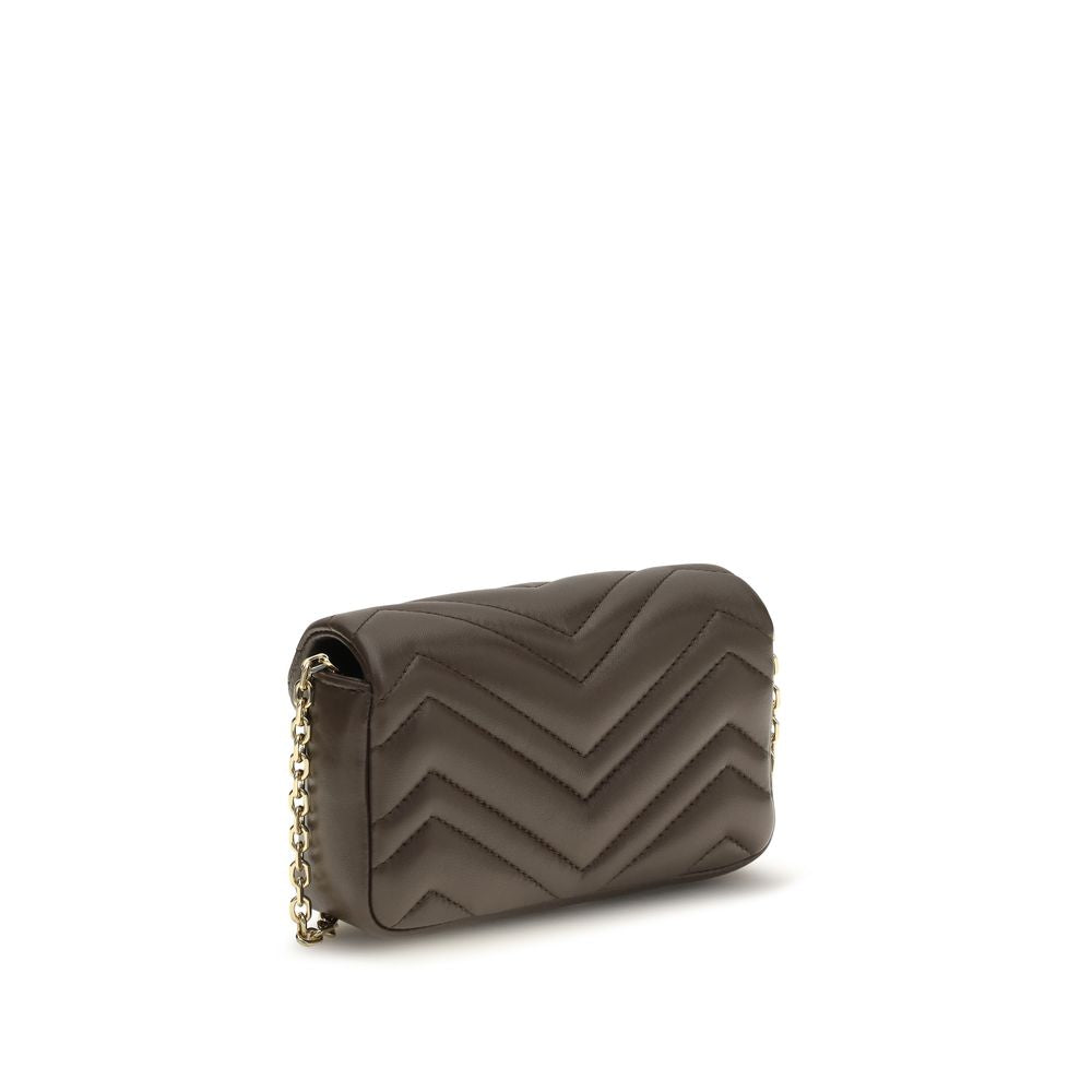 Elevate your style with the Gucci Brown Calf Leather Bos Taurus Handbag, a masterpiece of soft matelassé craftsmanship, embodying timeless elegance and sophistication.