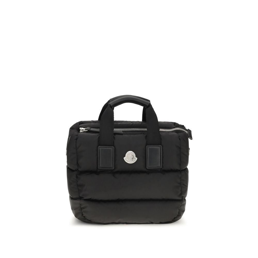 Discover the Moncler Black Nylon Shoulder Bag, a luxurious blend of quilted elegance and functional design, perfect for those who embody sophistication and style.