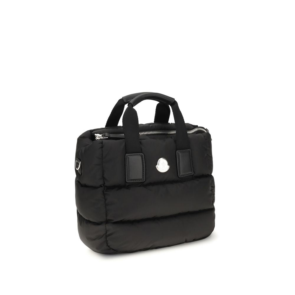 Discover the Moncler Black Nylon Shoulder Bag, a luxurious blend of quilted nylon and down, embodying architectural elegance for the discerning individual.