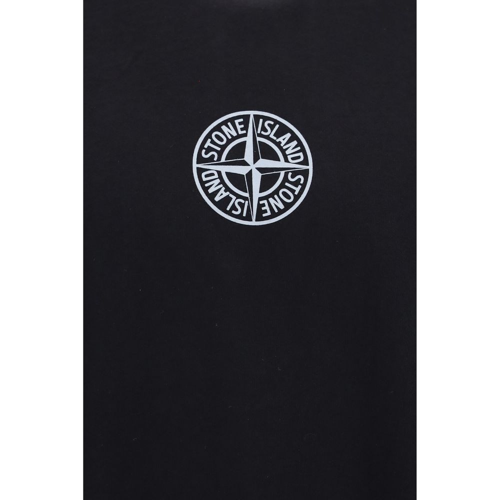 Elevate your style with the Stone Island Black Cotton T-Shirt, crafted from 100% organic cotton, embodying timeless luxury and sophistication for the modern connoisseur.