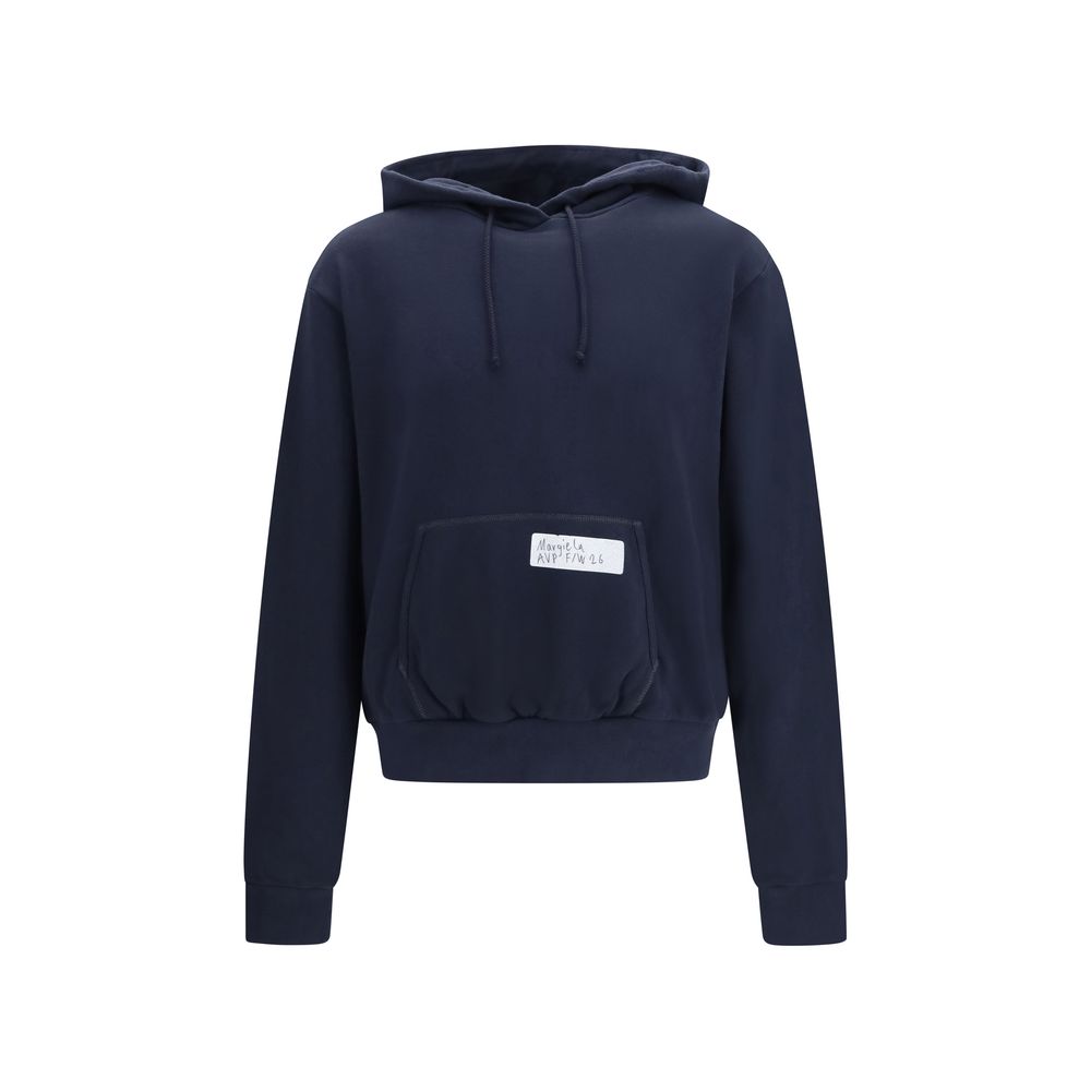 Indulge in the Maison Margiela Blue Cotton Sweatshirt, a luxurious blend of comfort and style, crafted for the discerning individual who appreciates timeless elegance.