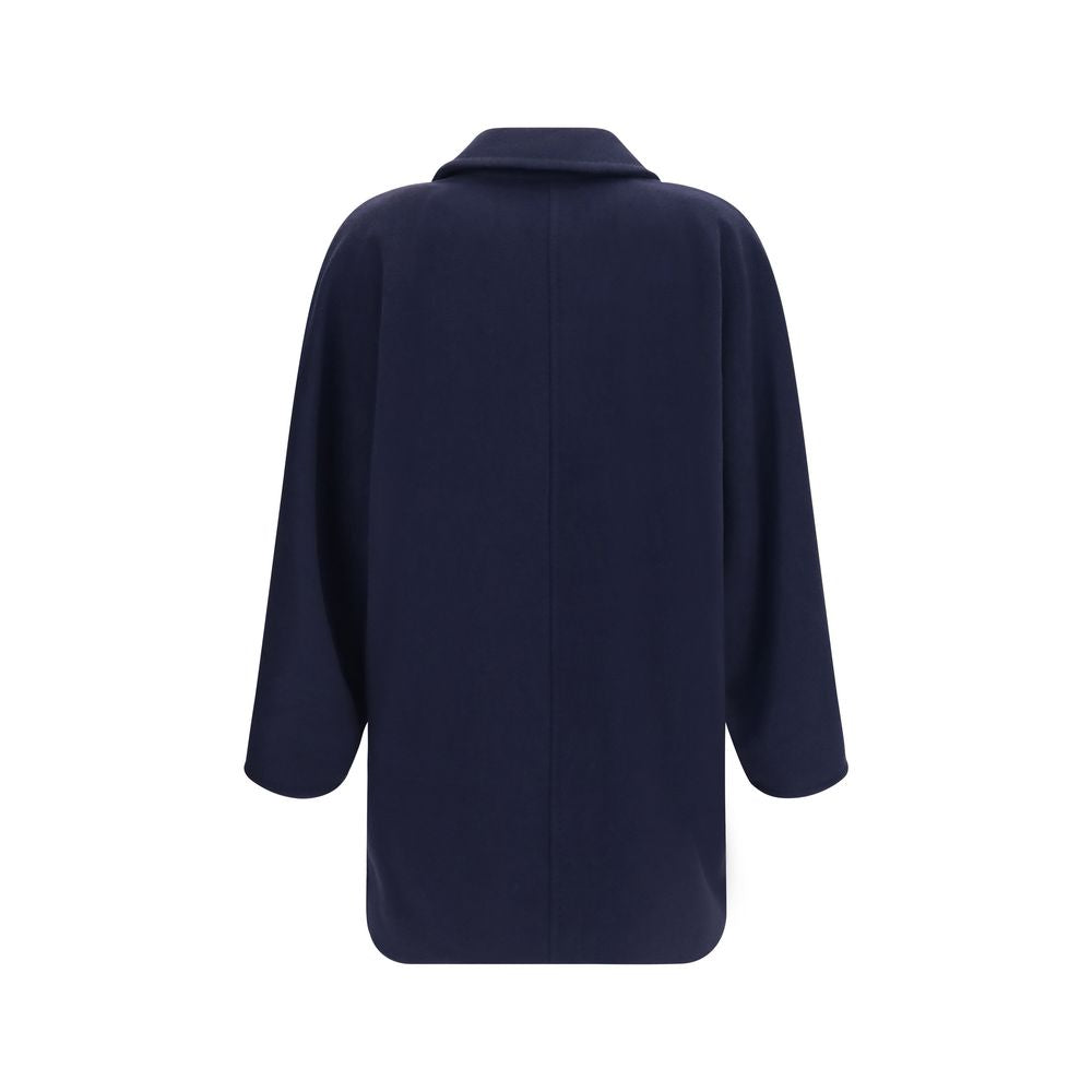Discover the Max Mara Blue Wool Oves Aries Full-Length Jacket, a masterpiece of tailored elegance crafted from luxurious Merino wool and cashmere, perfect for sophisticated occasions.