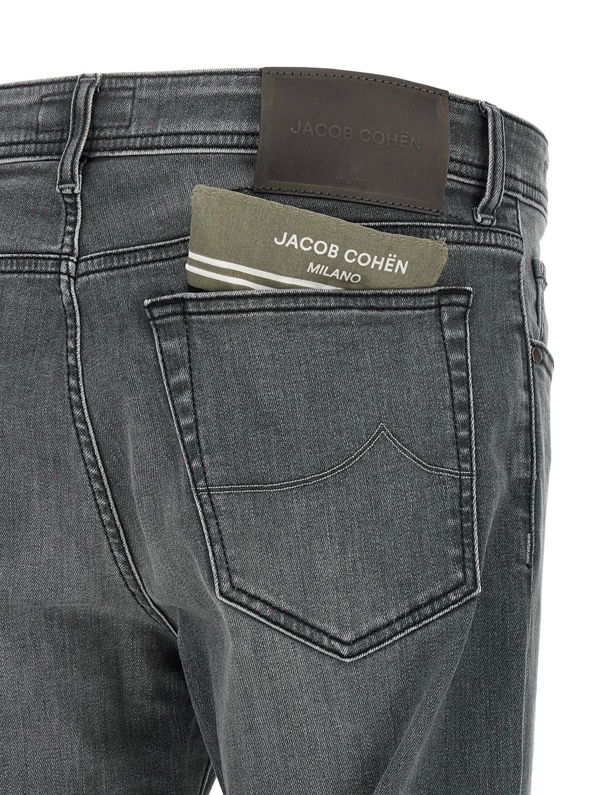 Discover the Jacob Cohen Gray Cotton Slim Fit Jeans, where exquisite Italian craftsmanship meets timeless elegance, perfect for those who embody luxury and sophistication.