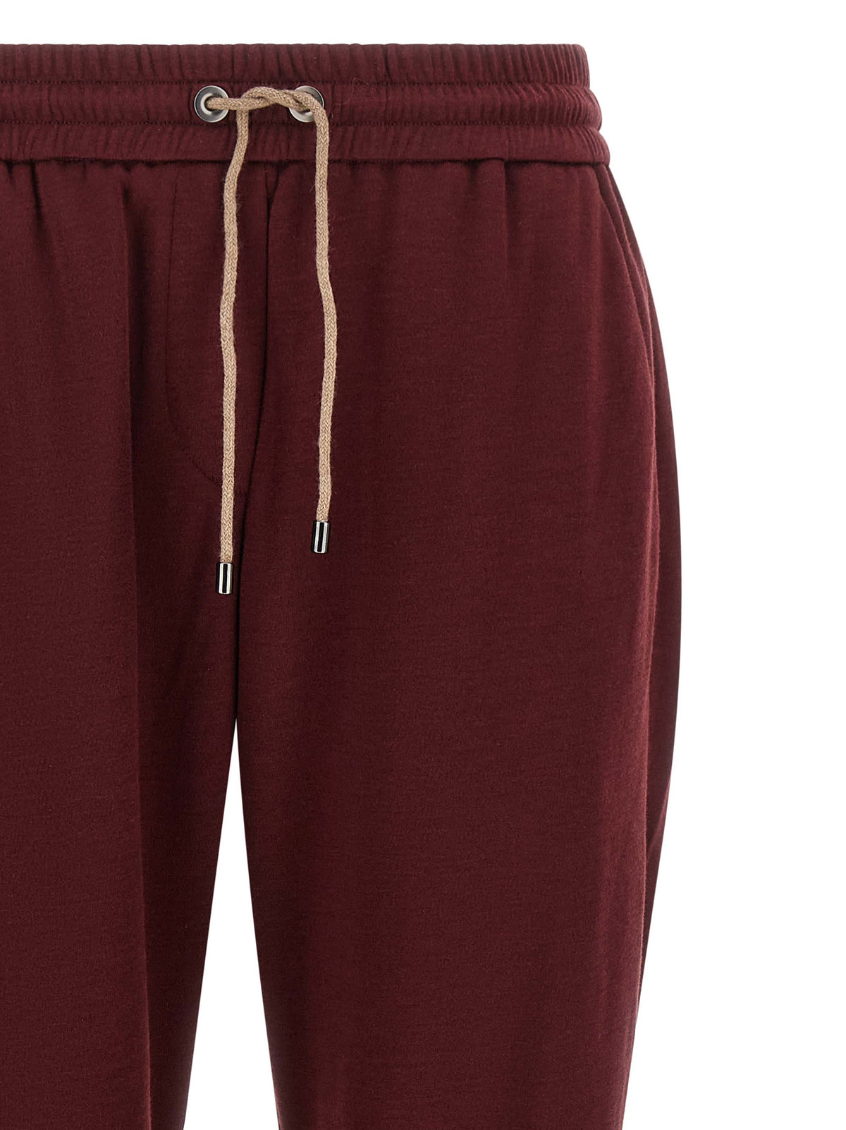 Elevate your leisurewear with Brunello Cucinelli Bordeaux Cotton Joggers, a luxurious blend of cotton and silk that embodies sophistication and effortless elegance.