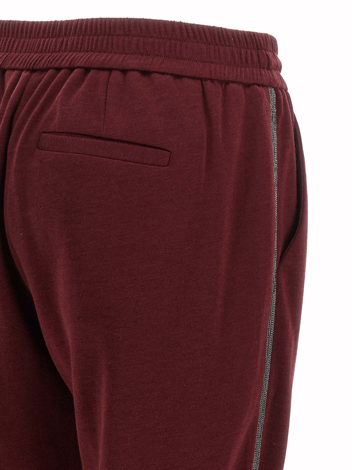 Experience the exquisite allure of Brunello Cucinelli Bordeaux Cotton Joggers, where luxurious cotton-silk blend meets sophisticated design, perfect for the discerning individual.